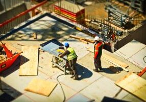 2-man-on-construction-site-during-daytime-159306-1